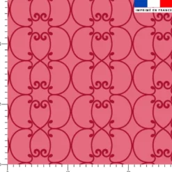 Arabesques rouge foncé - Fond rose