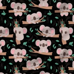 Bébé koala sur branche d'arbre - Fond noir