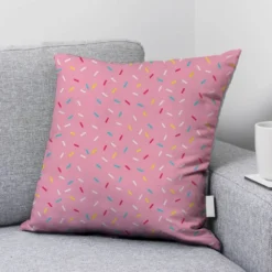 Confettis multicolores - Fond rose