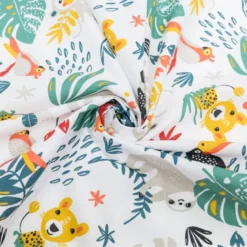 Coton blanc motif animaux de la jungle ocre et feuille tropicale papaya