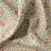 Coton enduit motif fleurs et feuilles