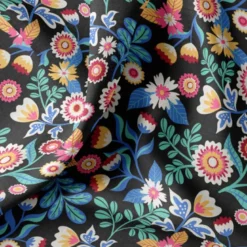 Coton noir motif fleurs multicolores