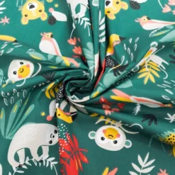 Coton vert motif animaux de la jungle et feuille tropicale papaya