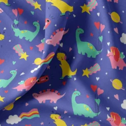 Coton violet motif fiesta dinosaures