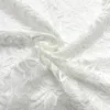 Dentelle blanc cassé motif fleur