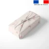 Etoiles et demi-lunes roses - Fond beige rosé