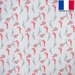 Feutrine blanche motif canne à sucre et baie de Noël