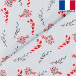 Feutrine blanche motif canne à sucre et baie de Noël