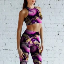 Lycra imprimé magma noir et rose poudre d'or