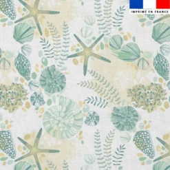 Mousseline blanche motif coquillage et étoile de mer vert