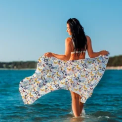 Mousseline blanche motif papillons jaunes