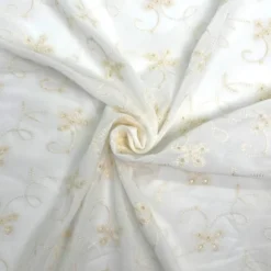 Mousseline ivoire brodée fleurs