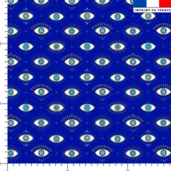 Oeil bleu scintillant - Fond bleu foncé