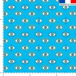 Oeil bleu scintillant - Fond bleu