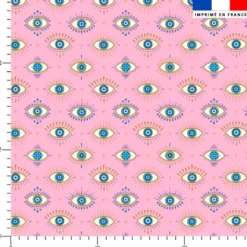Oeil bleu scintillant - Fond rose
