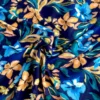 Popeline de viscose bleue motif fleurs aquarelles