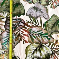Popeline de viscose crème motif feuilles tropicales vertes