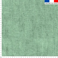 Tissu imperméable aspect lin vert pastel