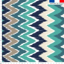 Tissu imperméable bleu motif chevron vert et grège