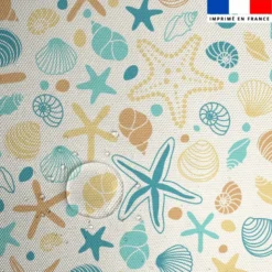 Tissu imperméable créme motif coquillage et étoile de mer