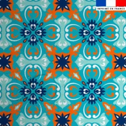 Tissu imperméable motif carreaux de ciment bleu orange et turquoise