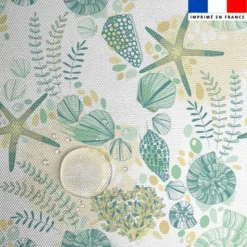 Tissu imperméable motif coquillage et étoile de mer vert