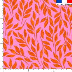 Tissu imperméable motif feuilles rouges et pois jaune
