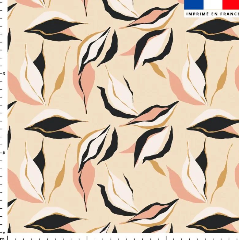 Tissu imperméable motif feuilles roses et beiges