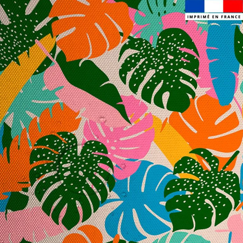 Tissu imperméable motif feuilles monstera multicolore