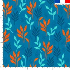 Tissu imperméable motif feuille et plante orange et bleue