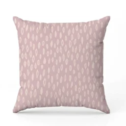 Tissu imperméable motif losange abstrait fond rose