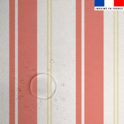 Tissu imperméable motif rayures verticales corail et beige doré