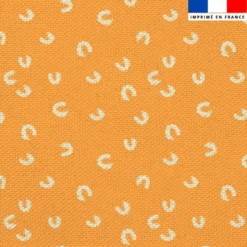 Tissu imperméable motif tacheté léopard jaune