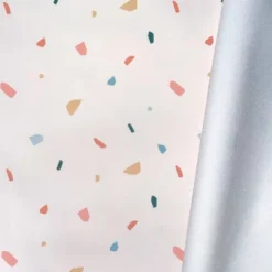 Tissu imperméable type ciré écru motif tiles