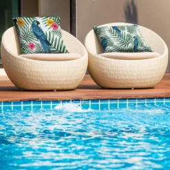 Tissu imperméable vert motif perroquet bleu et feuille tropicale