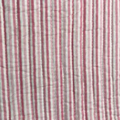Tissu matelassé blanc réversible motif fleurs et rayures roses