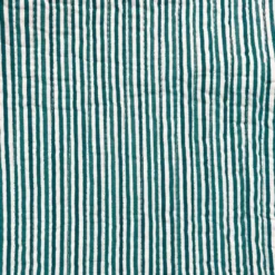 Tissu matelassé bleu réversible motif fleurs et rayures bleues