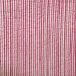 Tissu matelassé fuchsia réversible motif fleurs et rayures fuchsia