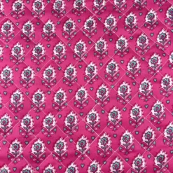 Tissu matelassé réversible motif fleurs ethniques fuchsia
