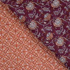 Tissu matelassé réversible motif fleurs ethniques et design géométrique