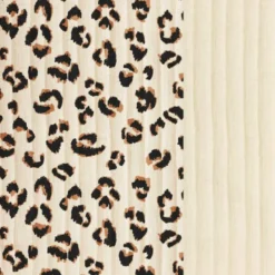 Tissu matelassé réversible motif léopard écru