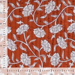 Tissu matelassé réversible motif fleurs ethniques cognac