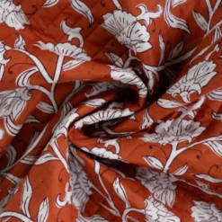 Tissu matelassé réversible motif fleurs ethniques cognac