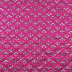Tissu matelassé réversible motif tâches léopard et fleurs fuchsia