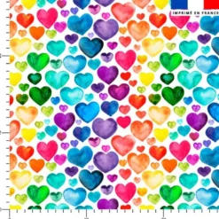 Toile coton motif coeurs arc-en-ciel effet aquarelle