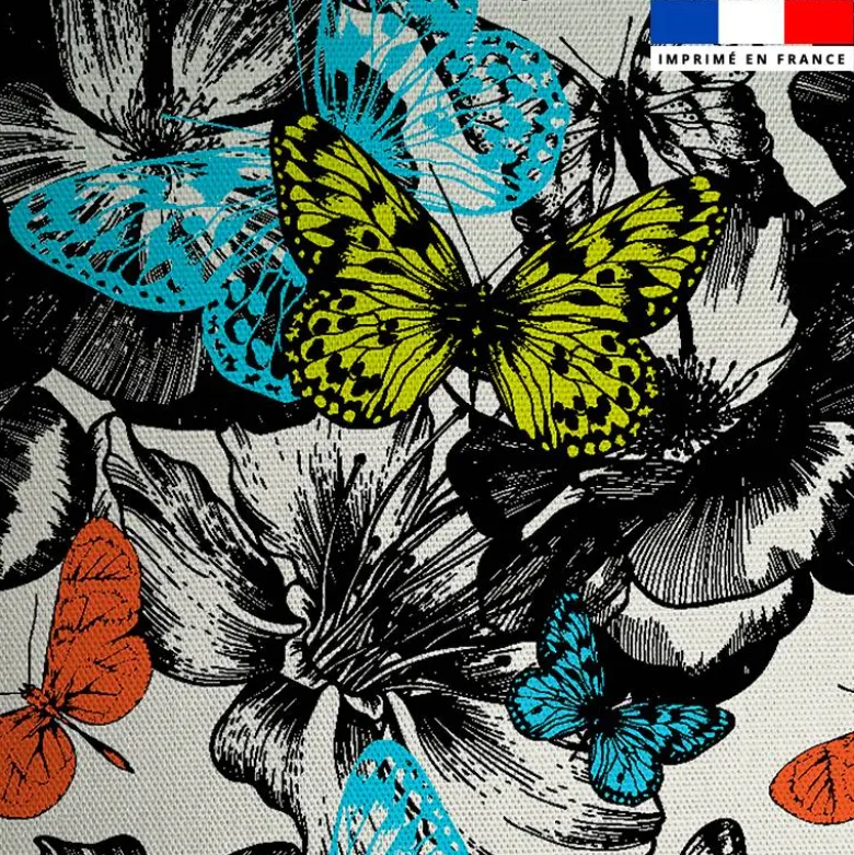 Toile coton motif papillon coloré et fleur noire