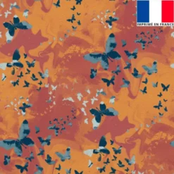 Velours orange imprimé papillon