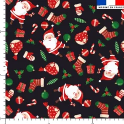 Voile de coton lurex motif papa de noel et sucre d'orge