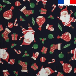 Voile de coton lurex motif papa de noel et sucre d'orge
